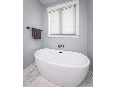 Welcome to your dream lakehouse featuring a boat slip. Enjoy on  in Arkansas - for sale on GolfHomes.com, golf home, golf lot