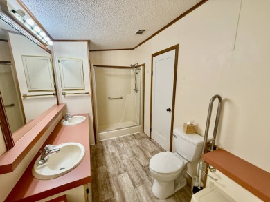 Home is located in Water Oak Country Club Estates an active 55 on Water Oak Country Club Estates in Florida - for sale on GolfHomes.com, golf home, golf lot