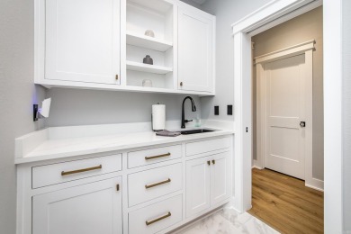 Welcome to your dream lakehouse featuring a boat slip. Enjoy on  in Arkansas - for sale on GolfHomes.com, golf home, golf lot