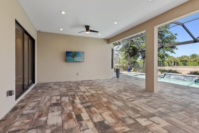 This stunning home overlooking a peaceful lake is located in one on Esplanade Golf and  Country Club in Florida - for sale on GolfHomes.com, golf home, golf lot
