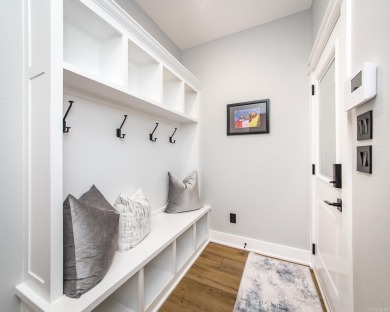 Welcome to your dream lakehouse featuring a boat slip. Enjoy on  in Arkansas - for sale on GolfHomes.com, golf home, golf lot