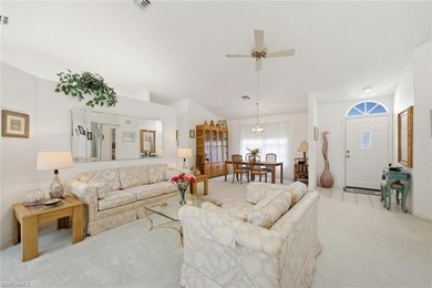 This spacious home with tremendous curb appeal is being sold on Riviera Golf Club in Florida - for sale on GolfHomes.com, golf home, golf lot