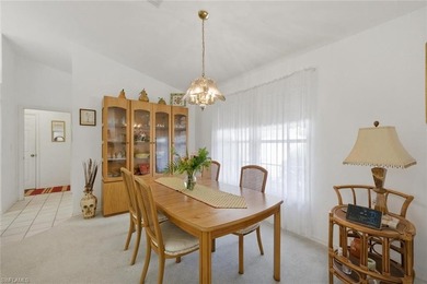 This spacious home with tremendous curb appeal is being sold on Riviera Golf Club in Florida - for sale on GolfHomes.com, golf home, golf lot