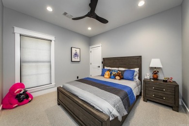 Welcome to your dream lakehouse featuring a boat slip. Enjoy on  in Arkansas - for sale on GolfHomes.com, golf home, golf lot