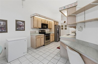 This spacious home with tremendous curb appeal is being sold on Riviera Golf Club in Florida - for sale on GolfHomes.com, golf home, golf lot