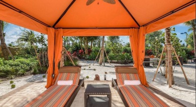 This stunning home overlooking a peaceful lake is located in one on Esplanade Golf and  Country Club in Florida - for sale on GolfHomes.com, golf home, golf lot
