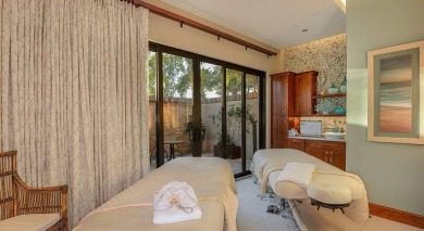 This stunning home overlooking a peaceful lake is located in one on Esplanade Golf and  Country Club in Florida - for sale on GolfHomes.com, golf home, golf lot