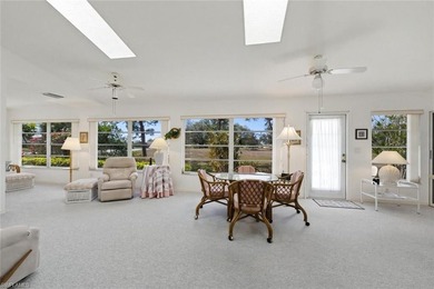 This spacious home with tremendous curb appeal is being sold on Riviera Golf Club in Florida - for sale on GolfHomes.com, golf home, golf lot