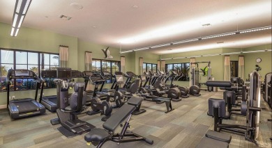 This stunning home overlooking a peaceful lake is located in one on Esplanade Golf and  Country Club in Florida - for sale on GolfHomes.com, golf home, golf lot