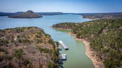 Welcome to your dream lakehouse featuring a boat slip. Enjoy on  in Arkansas - for sale on GolfHomes.com, golf home, golf lot