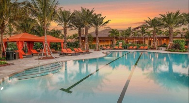 This stunning home overlooking a peaceful lake is located in one on Esplanade Golf and  Country Club in Florida - for sale on GolfHomes.com, golf home, golf lot