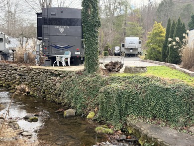 WOW! This is a MUST SEE! A SPECTACULAR creek lot in the sought on Bent Creek Golf Course in Tennessee - for sale on GolfHomes.com, golf home, golf lot