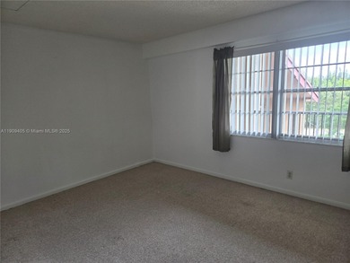 Bright and clean 1-bedroom, 1-bath unit located on the 4th floor on  in Florida - for sale on GolfHomes.com, golf home, golf lot