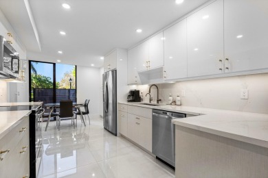 WALK TO EVERYTHING Renovated inside and out, new roofs, fencing on Boca West Golf and Country Club in Florida - for sale on GolfHomes.com, golf home, golf lot