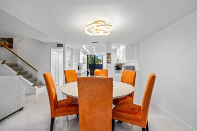 WALK TO EVERYTHING Renovated inside and out, new roofs, fencing on Boca West Golf and Country Club in Florida - for sale on GolfHomes.com, golf home, golf lot