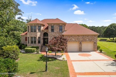 This custom 4-bedroom, 2.5-bath brick home is a true gem on Brunswick Plantation and Golf Resorts in North Carolina - for sale on GolfHomes.com, golf home, golf lot