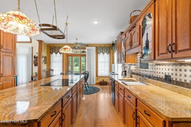 This custom 4-bedroom, 2.5-bath brick home is a true gem on Brunswick Plantation and Golf Resorts in North Carolina - for sale on GolfHomes.com, golf home, golf lot