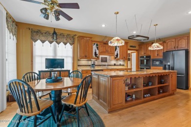 This custom 4-bedroom, 2.5-bath brick home is a true gem on Brunswick Plantation and Golf Resorts in North Carolina - for sale on GolfHomes.com, golf home, golf lot