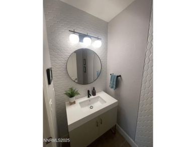 Experience unparalleled comfort and breathtaking views in this on Somersett Country Club in Nevada - for sale on GolfHomes.com, golf home, golf lot