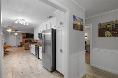 Positioned between the peaceful setting of Amon Carter Lake and on Twisted Oaks Golf Club in Texas - for sale on GolfHomes.com, golf home, golf lot