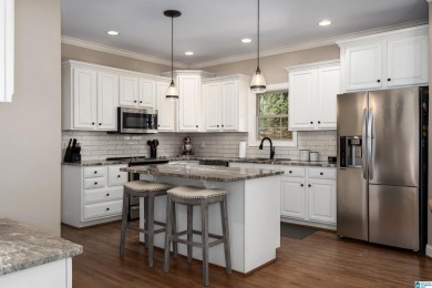 Step inside this beautifully updated 3-bedroom, 2.5-bath home in on Ballantrae Golf Club in Alabama - for sale on GolfHomes.com, golf home, golf lot