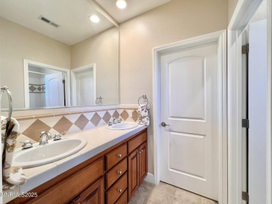 Experience unparalleled comfort and breathtaking views in this on Somersett Country Club in Nevada - for sale on GolfHomes.com, golf home, golf lot