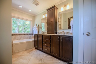 Experience the perfect combination of scenic beauty, energy on Eagle Ridge Golf Course in North Carolina - for sale on GolfHomes.com, golf home, golf lot