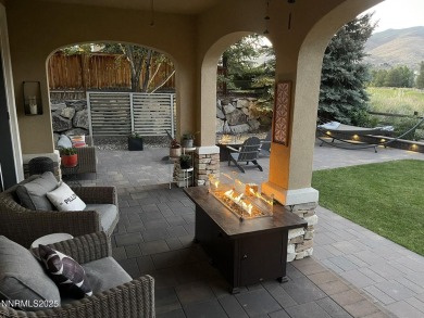 Experience unparalleled comfort and breathtaking views in this on Somersett Country Club in Nevada - for sale on GolfHomes.com, golf home, golf lot