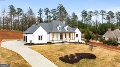 DISCOVER YOUR DREAM HOME IN HARBOR CLUB!  THIS SPACIOUS RANCH ON on Harbor Club Golf and Country Club in Georgia - for sale on GolfHomes.com, golf home, golf lot