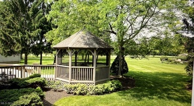 Luxury, location, and lifestyle come together in this on Barrington Golf Club in Ohio - for sale on GolfHomes.com, golf home, golf lot