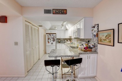 Welcome to this 2 bedroom/2 bathroom apartment in the Gardens of on Boca Grove Golf and Tennis in Florida - for sale on GolfHomes.com, golf home, golf lot