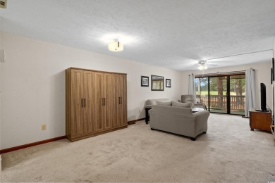 Discover your perfect getaway in this delightful first-floor on Myrtlewood Golf Course and Club  in South Carolina - for sale on GolfHomes.com, golf home, golf lot