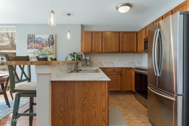 Located in the heart of Eagle-Ranch, this spacious 2-bed, 2-bath on Eagle Ranch in Colorado - for sale on GolfHomes.com, golf home, golf lot