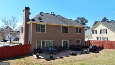 This 4 bedroom 2.5 bath home offers the perfect blend of comfort on Mirror Lake Golf Club in Georgia - for sale on GolfHomes.com, golf home, golf lot