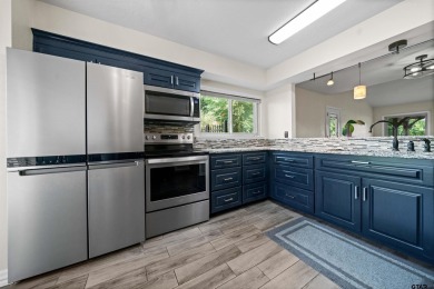 Beautiful duplex located on the #1 fairway on the golf course in on Holly Lake Ranch Golf Club in Texas - for sale on GolfHomes.com, golf home, golf lot