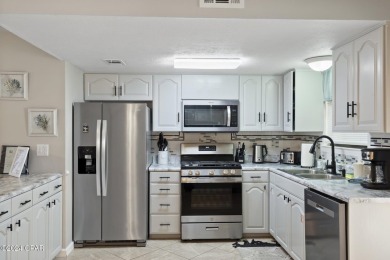 Welcome to your dream townhouse in a Gulf-front community, just on Edgewater Beach Resort in Florida - for sale on GolfHomes.com, golf home, golf lot