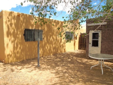 Welcome to this charming townhouse located only 0.3 miles from on Ladera Golf Course  in New Mexico - for sale on GolfHomes.com, golf home, golf lot