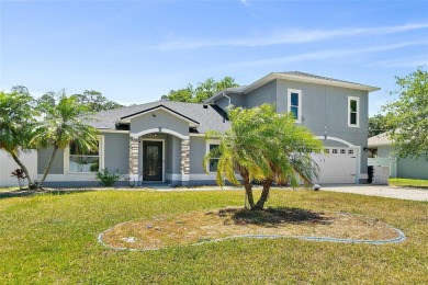 This lovely home is located in the very desirable Cypress Knoll on The Grand Club Cypress Course in Florida - for sale on GolfHomes.com, golf home, golf lot