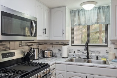 Welcome to your dream townhouse in a Gulf-front community, just on Edgewater Beach Resort in Florida - for sale on GolfHomes.com, golf home, golf lot