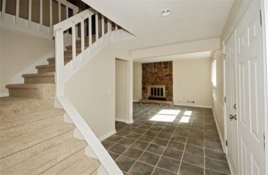This charming 4-bedroom 3-bath home is perfect for a growing on Hidden Hills Country Club in Georgia - for sale on GolfHomes.com, golf home, golf lot