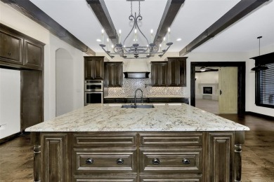 This exquisite modern Spanish-style custom home located in a on Sugar Tree Golf and Country Club in Texas - for sale on GolfHomes.com, golf home, golf lot