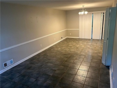 This charming 4-bedroom 3-bath home is perfect for a growing on Hidden Hills Country Club in Georgia - for sale on GolfHomes.com, golf home, golf lot