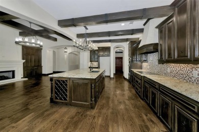 This exquisite modern Spanish-style custom home located in a on Sugar Tree Golf and Country Club in Texas - for sale on GolfHomes.com, golf home, golf lot