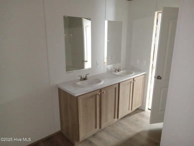 Great opportunity to own a new construction manufactured home on on Land-O-Lakes Golf Course in North Carolina - for sale on GolfHomes.com, golf home, golf lot