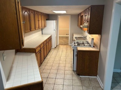 This charming 4-bedroom 3-bath home is perfect for a growing on Hidden Hills Country Club in Georgia - for sale on GolfHomes.com, golf home, golf lot