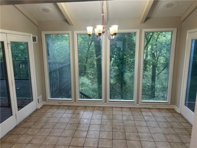 This charming 4-bedroom 3-bath home is perfect for a growing on Hidden Hills Country Club in Georgia - for sale on GolfHomes.com, golf home, golf lot
