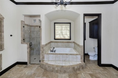 This exquisite modern Spanish-style custom home located in a on Sugar Tree Golf and Country Club in Texas - for sale on GolfHomes.com, golf home, golf lot