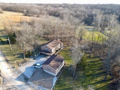 Your country oasis awaits! Located on 1.1 +/- unrestricted acres on Norwoods Golf Club in Missouri - for sale on GolfHomes.com, golf home, golf lot