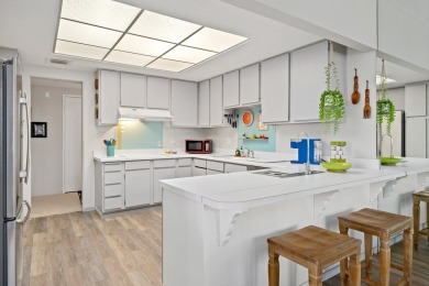 Enjoy Carefree living from this spacious corner unit with on Desert Island Golf and Country Club in California - for sale on GolfHomes.com, golf home, golf lot