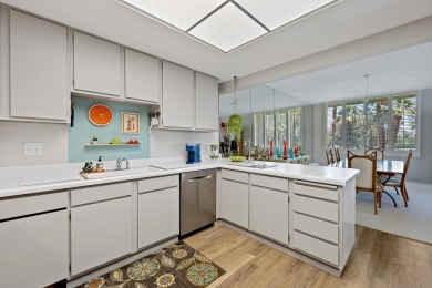 Enjoy Carefree living from this spacious corner unit with on Desert Island Golf and Country Club in California - for sale on GolfHomes.com, golf home, golf lot